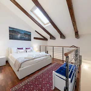 https://ca-del-pozzo-loft-apartment.hotelslidodijesolo.com